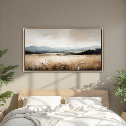 a bedroom with a large painting of a field of flowers hanging above the bed.