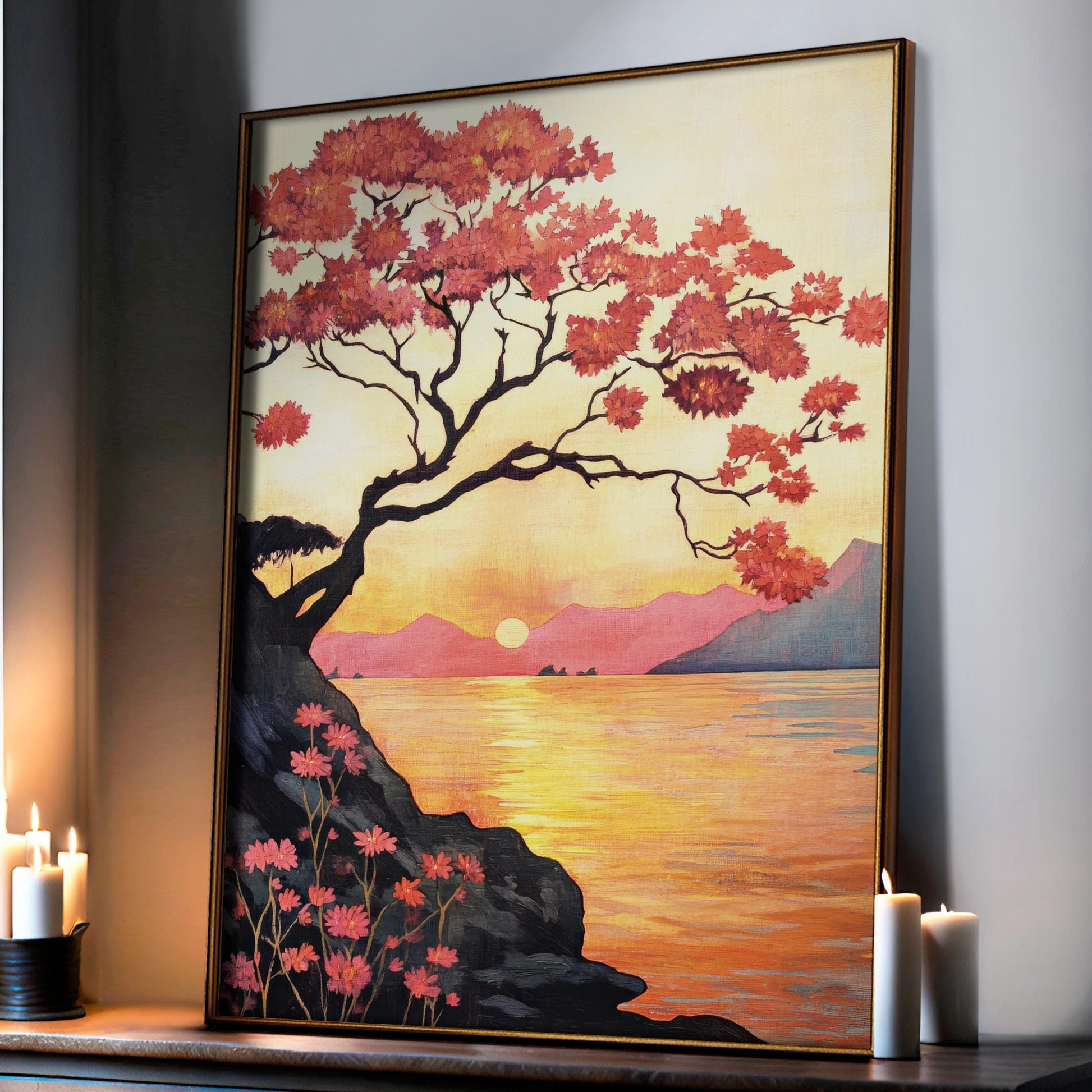 a painting of a tree on a wall next to a lit candle