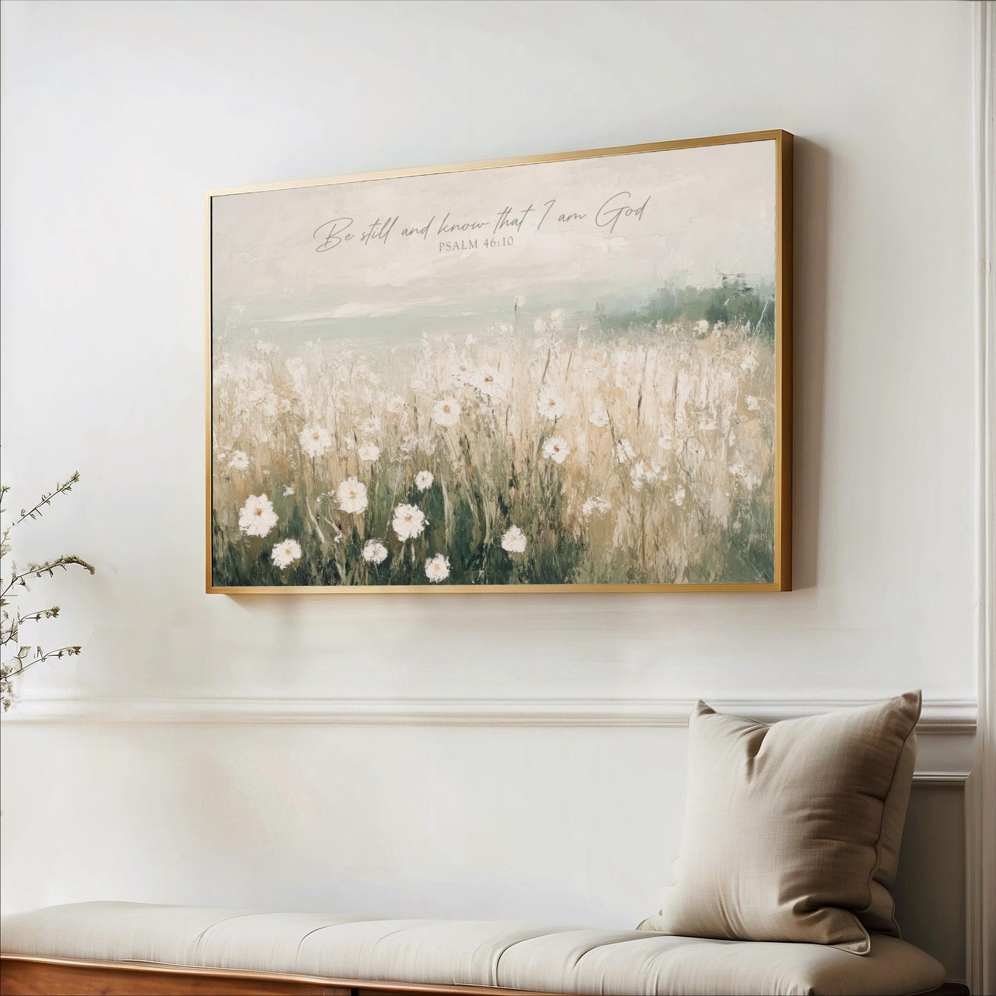 a large framed painting of a field of flowers hanging on a wall.