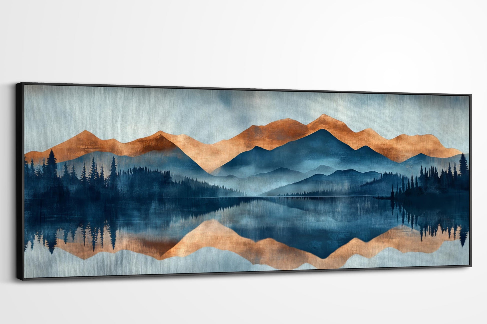 a serene landscape with a lake reflecting the mountains and trees in the background.