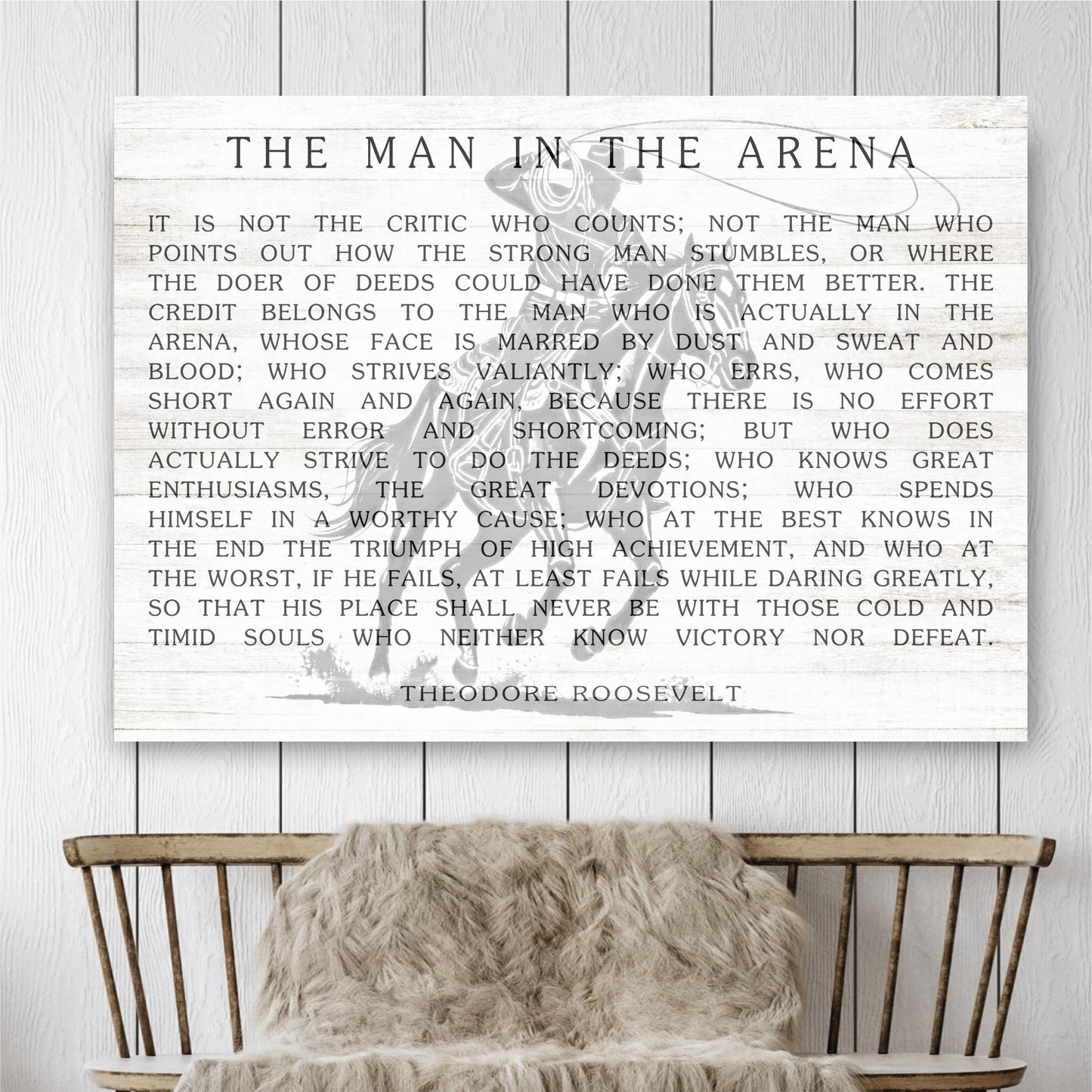 a quote by Theodore Roosevelt, a famous American president, displayed on a wall.