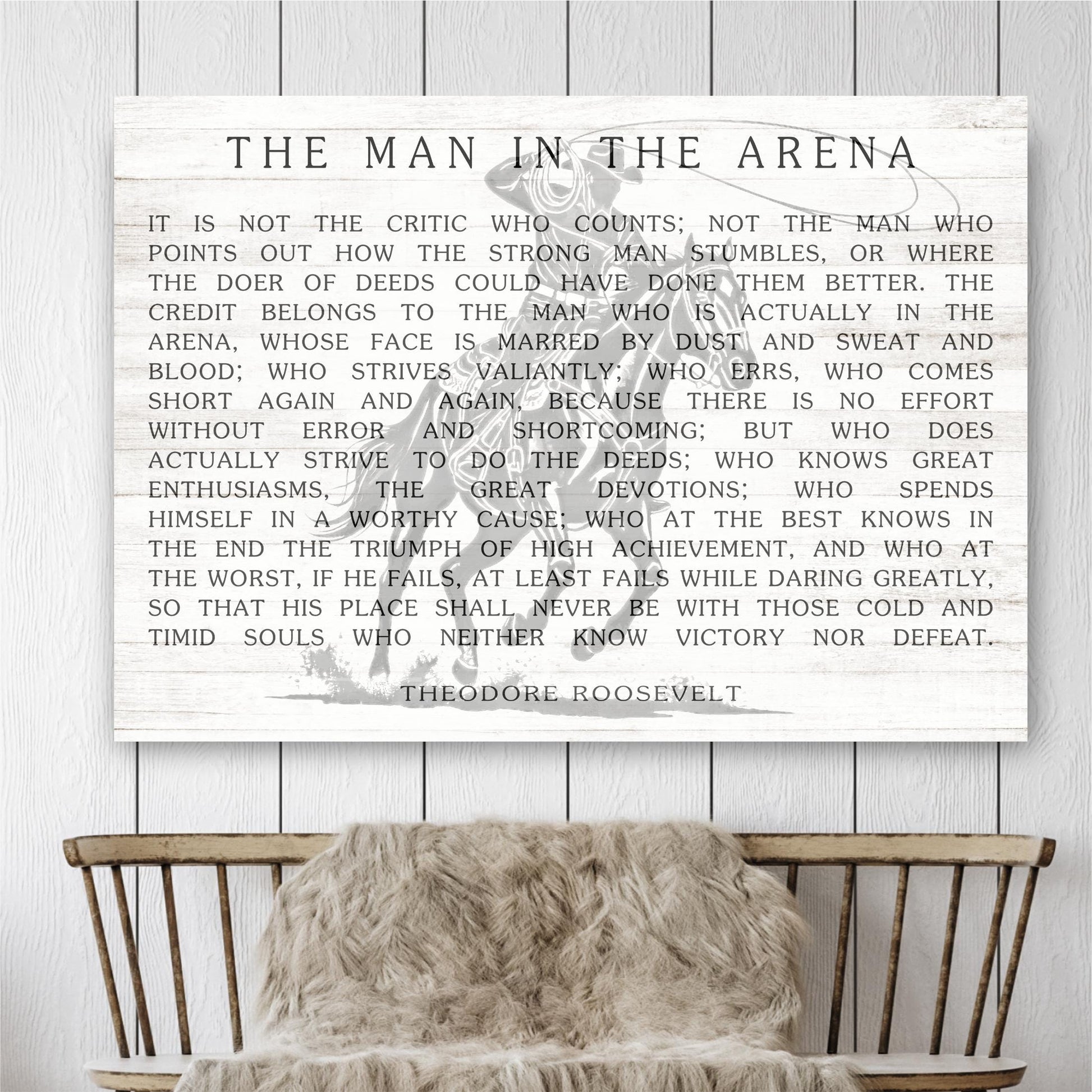 a quote by Theodore Roosevelt, a famous American president, displayed on a wall.