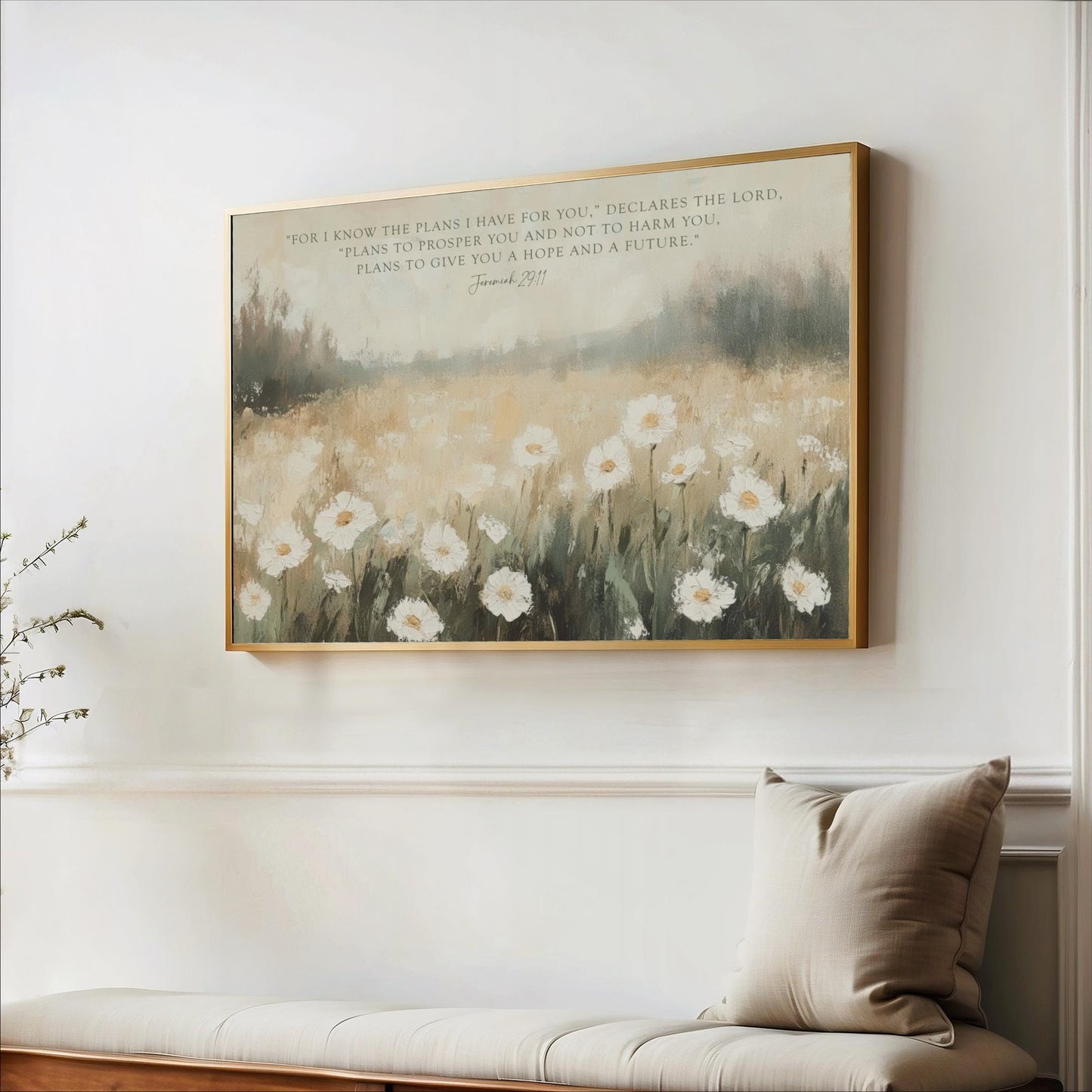 a painting of a field of white flowers hanging on a wall, with a quote from the Bible verse James 1:27 displayed below the painting.