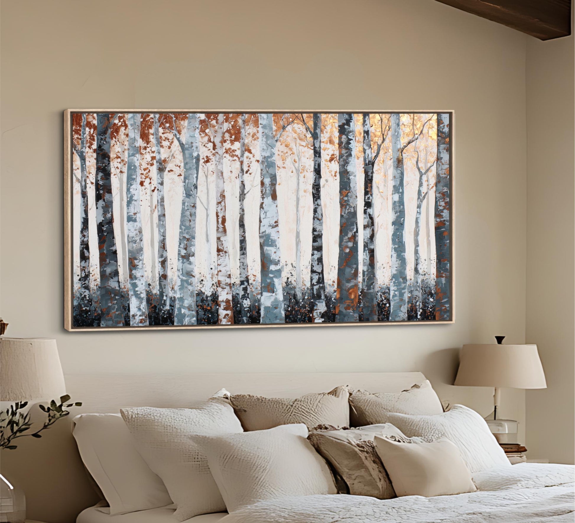 a large painting of a forest scene hanging on the wall above a bed with white bedding.