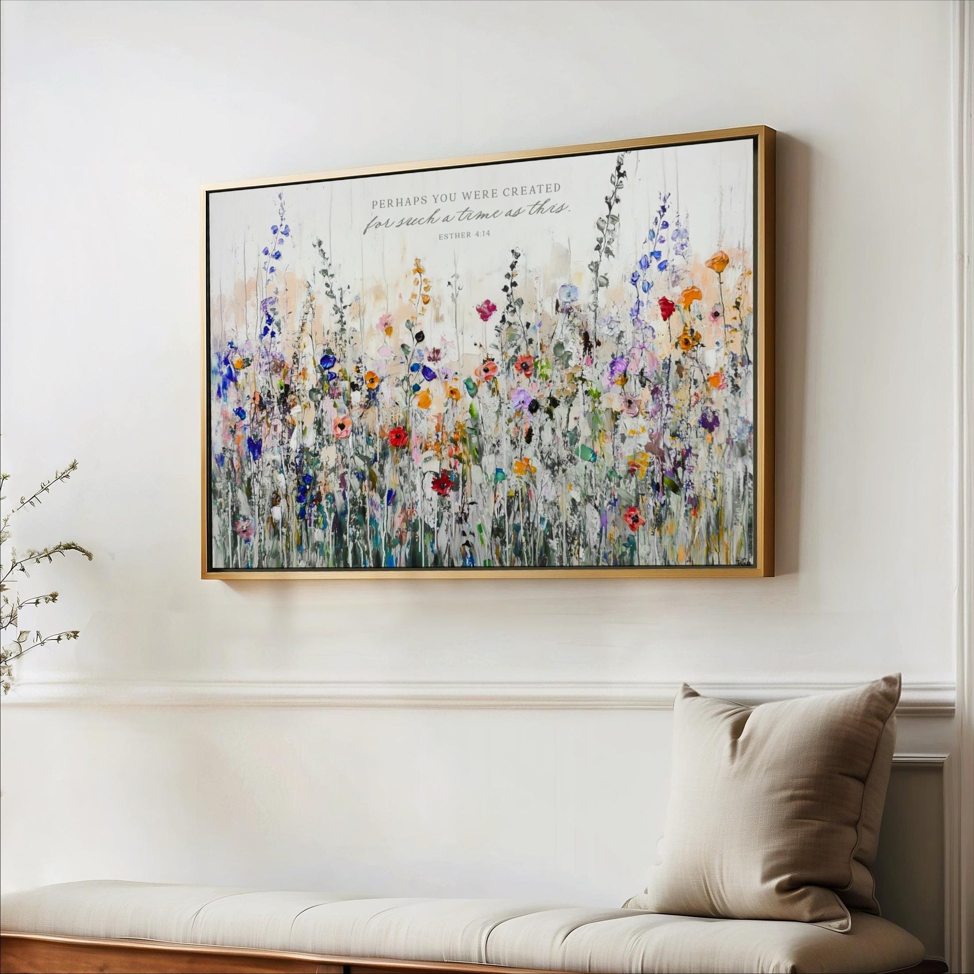 a large, colorful painting of a field of flowers hanging on a white wall.