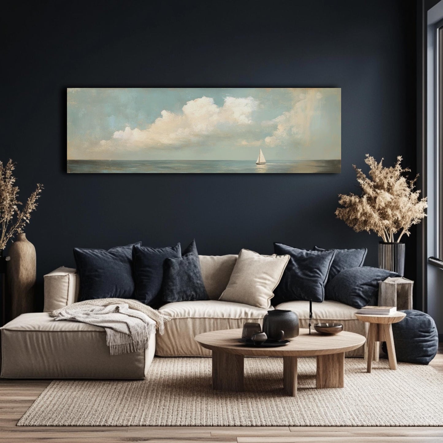 a modern living room with a large painting of a sailboat on the wall, a wooden coffee table, and a comfortable sofa with throw pillows.