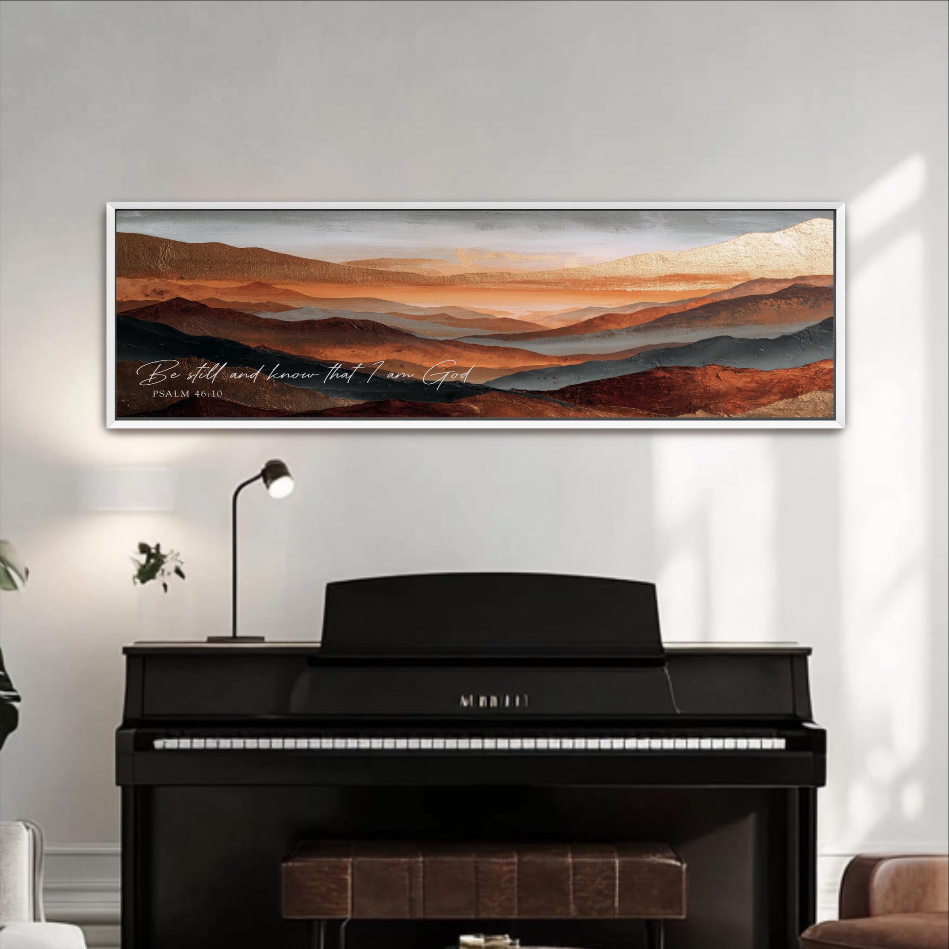 a large framed painting of a mountainous landscape above a black piano.