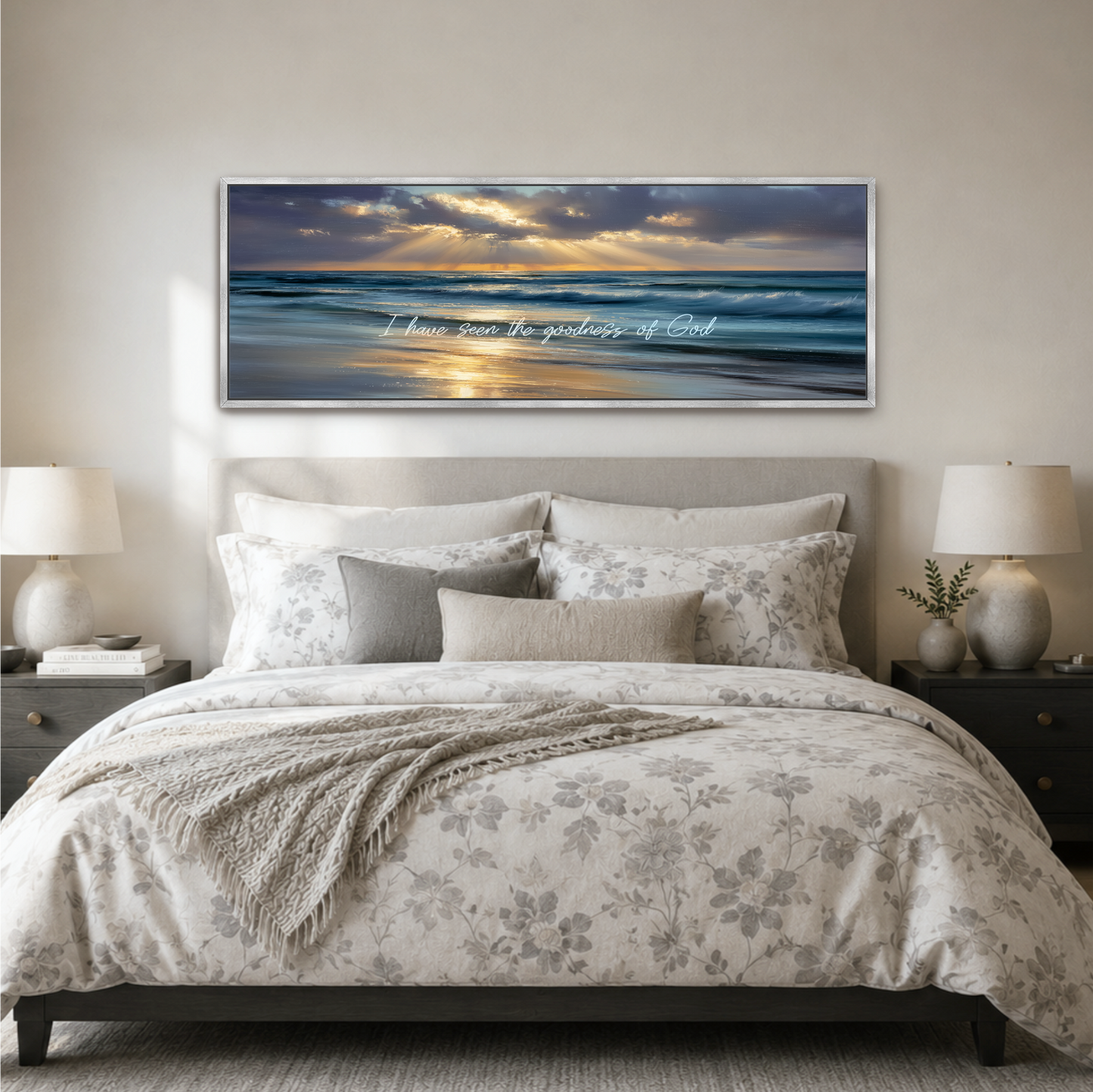 a large bedroom with a bed, nightstands, and a framed landscape photograph hanging above the bed.