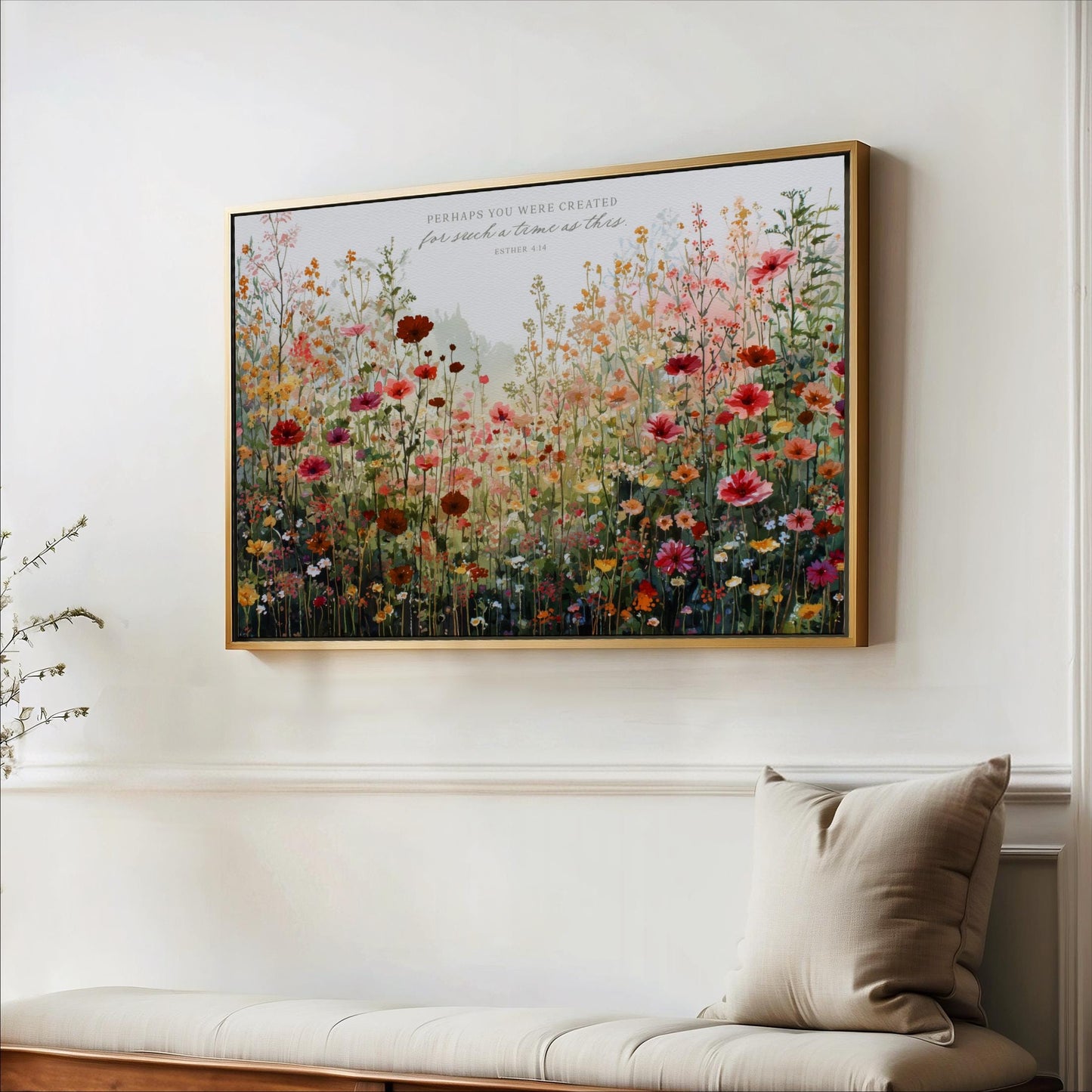 a large, colorful painting of a field of flowers hanging on a white wall.