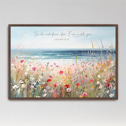 The image is a framed painting depicting a vibrant field of colorful flowers, with a serene body of water in the background.