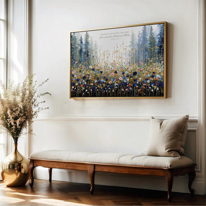 a large, framed painting of a field of flowers hanging on a white wall above a wooden bench.