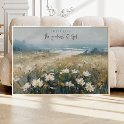 a framed painting of a field of white flowers, with a text overlay that reads "I HAVE SEEN the goodness of God".