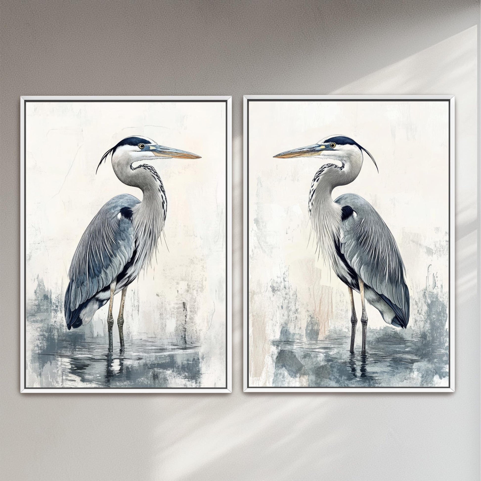 two paintings of a bird are hanging on a wall