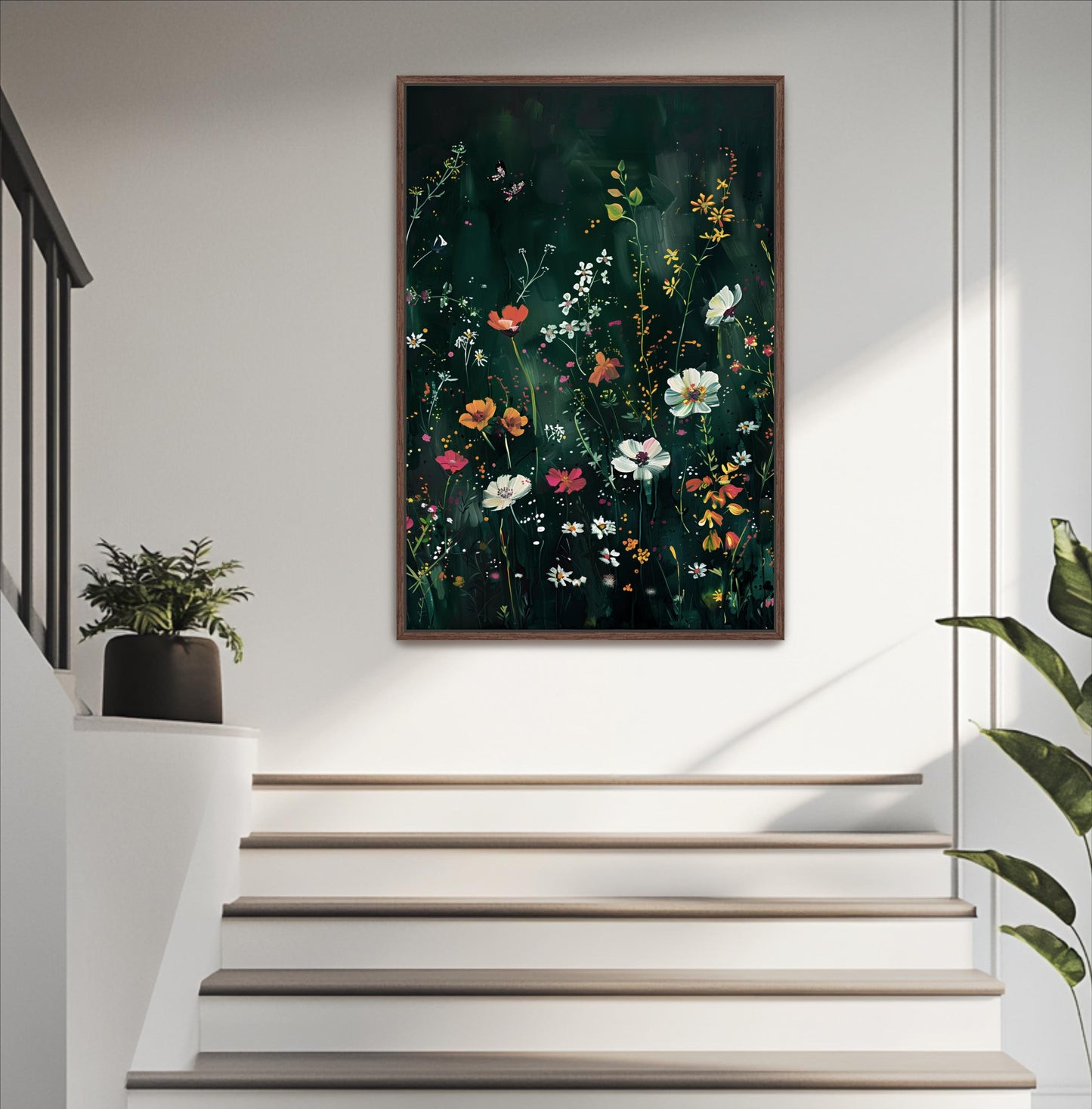 a large, colorful painting of flowers hanging on a white wall above a set of white stairs.