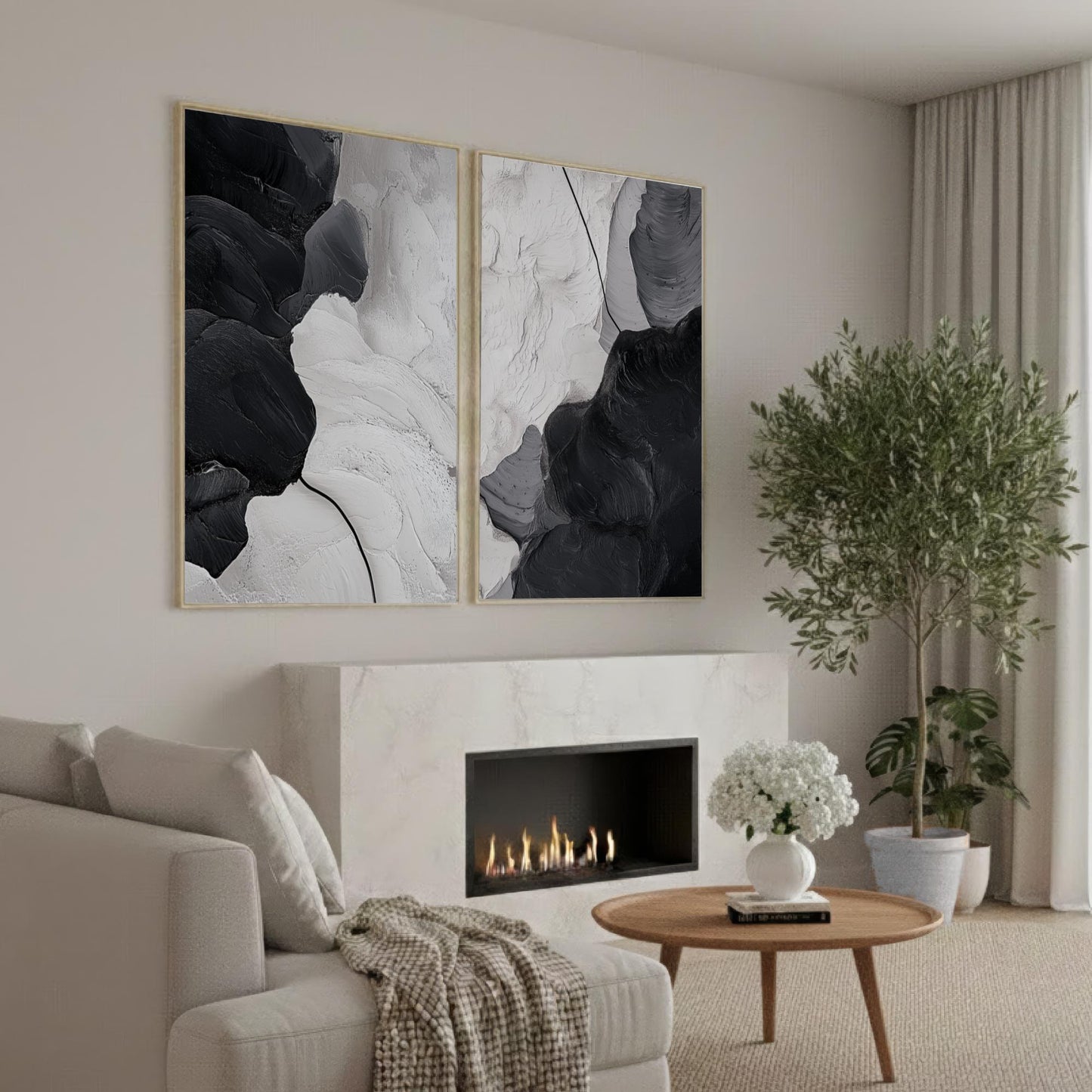 a cozy living room with a fireplace, a comfortable sofa, and a coffee table with a vase of white flowers. The room has a minimalist and modern design, with a large abstract painting on the wall and a potted plant adding a touch of greenery.