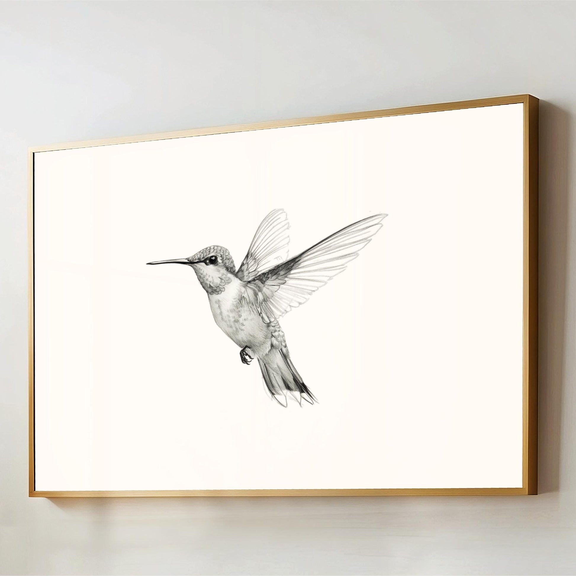 a black and white picture of a hummingbird flying
