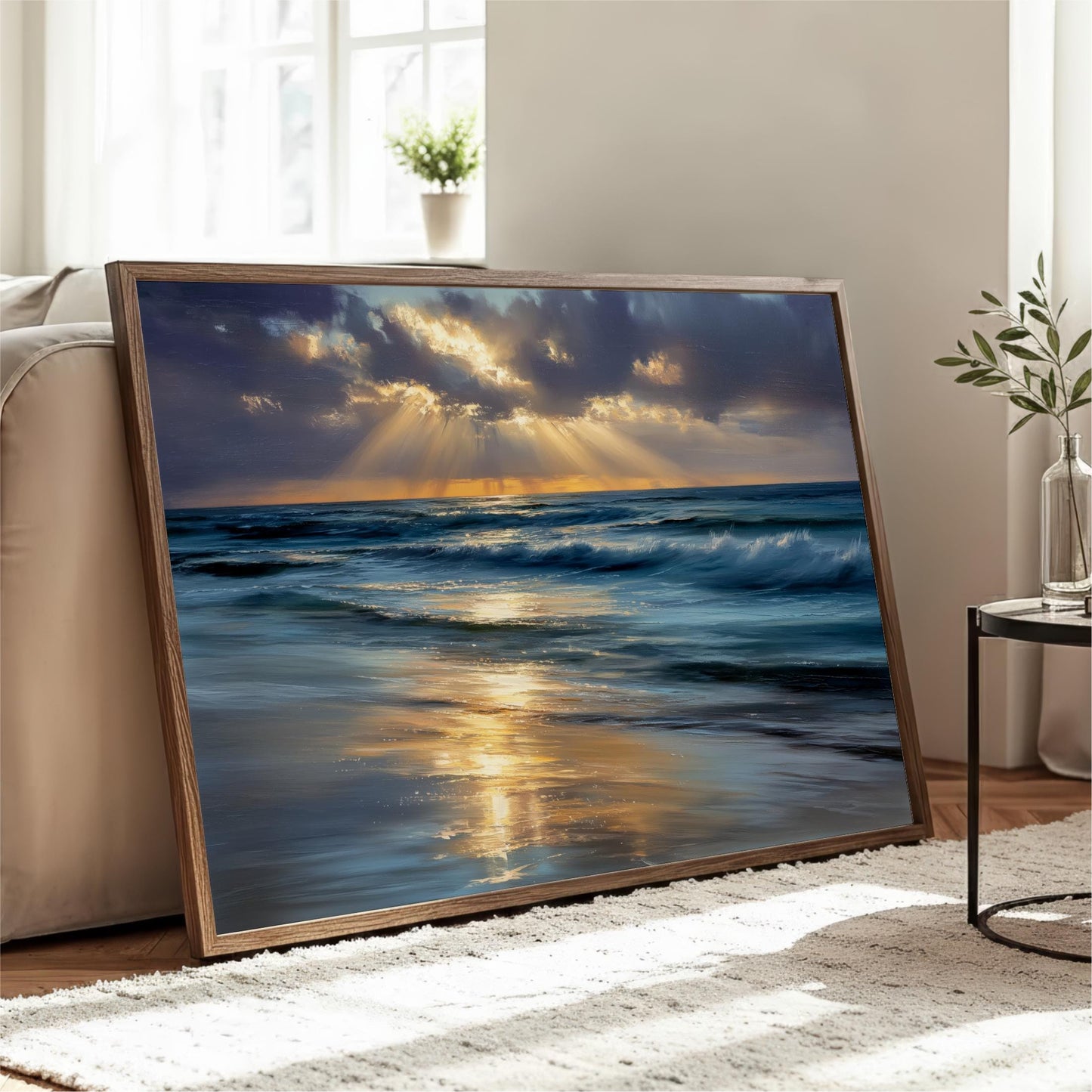 a large framed painting depicting a serene ocean scene with a sunset over the water.
