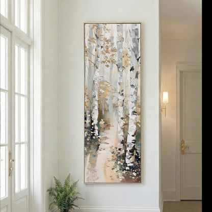 a large painting of a forest scene hanging on a white wall in a room with a window.