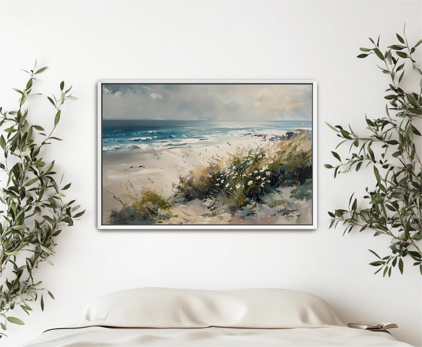 a painting hanging on a wall above a bed