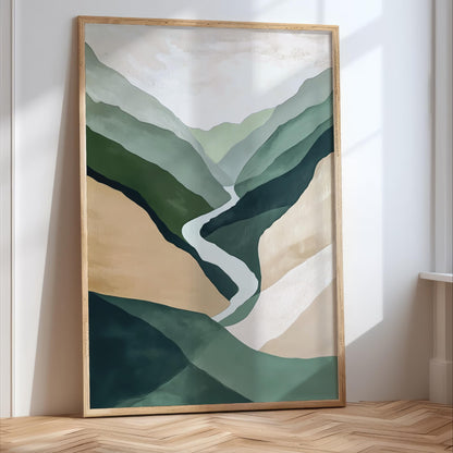 a large, framed painting depicting a mountainous landscape with a winding path through the hills.