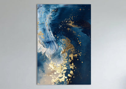 The image is an abstract painting with a blue background and gold splatters, creating a striking contrast between the two colors.