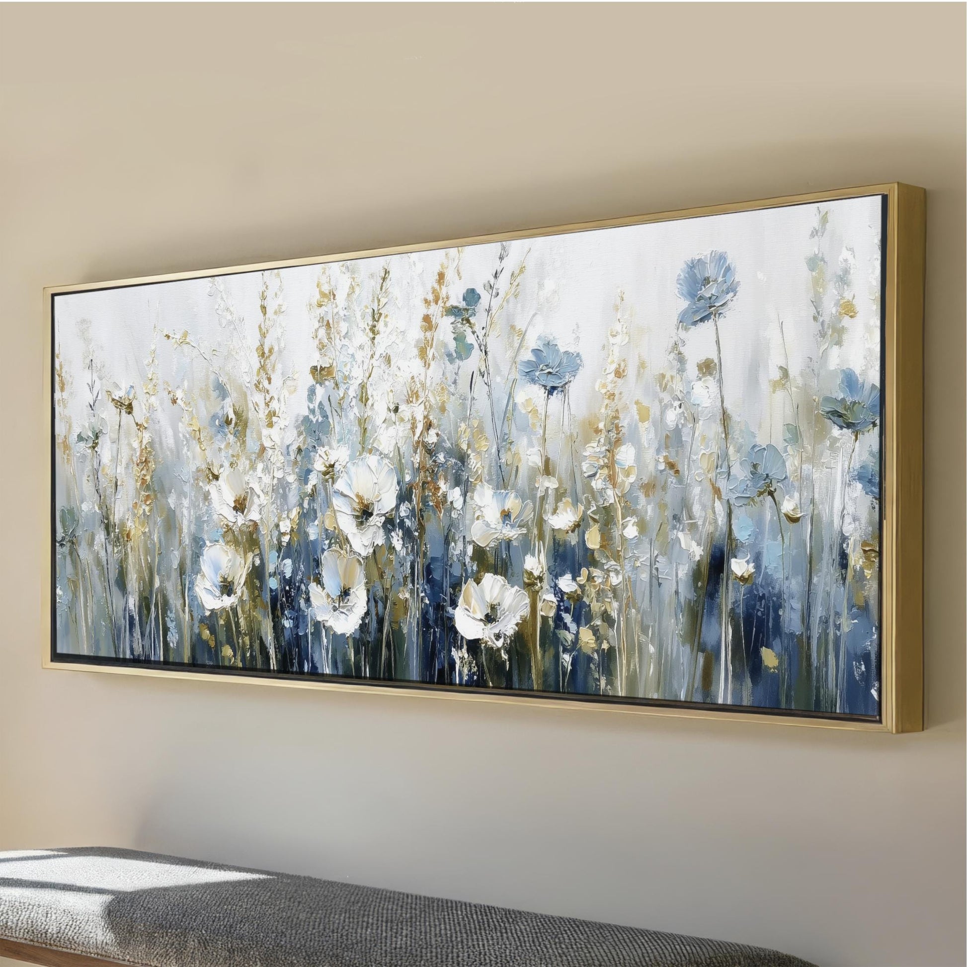 a large, framed painting of a field of flowers, with a predominantly blue and white color palette.