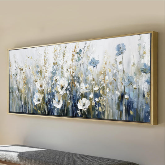 a large, framed painting of a field of flowers, with a predominantly blue and white color palette.