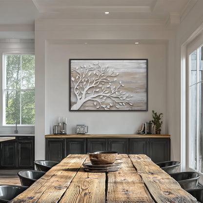 a modern dining room with a large wooden table surrounded by black chairs. A large tree-like artwork is displayed on the wall above the table, adding a natural element to the space. The room has a clean, minimalist design with white walls and a wooden floor.