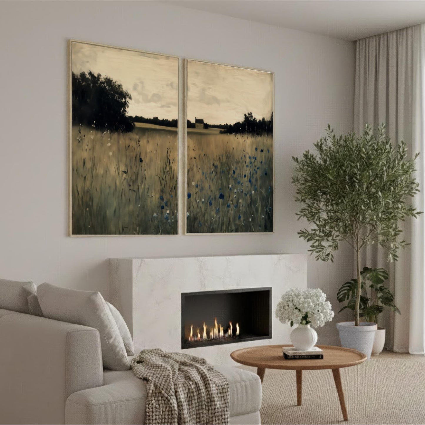 a cozy living room with a fireplace, a comfortable sofa, and a large painting of a field with trees hanging on the wall.