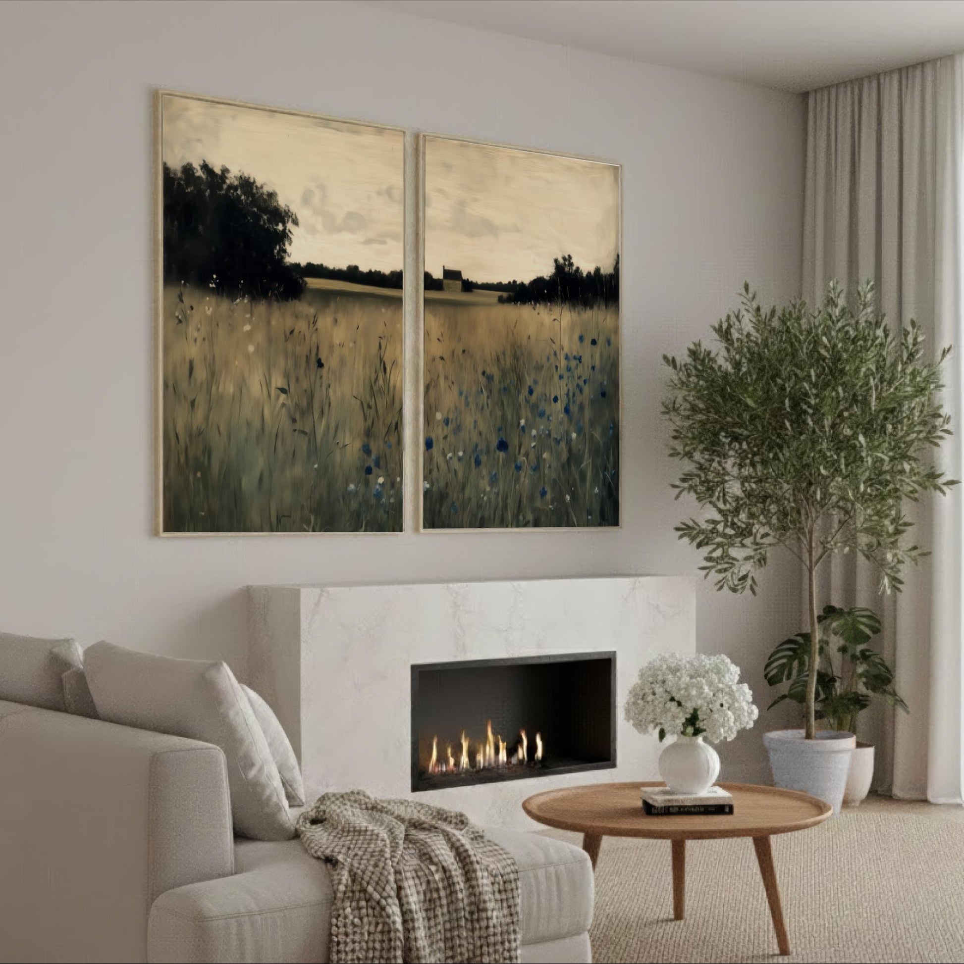a cozy living room with a fireplace, a comfortable sofa, and a large painting of a field with trees hanging on the wall.