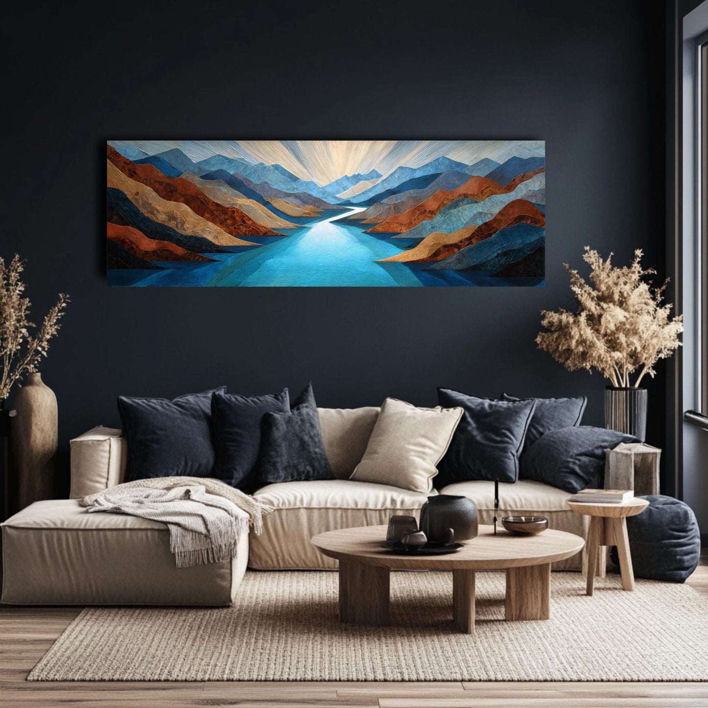 a living room with a large painting of a mountain landscape hanging on the wall above a white sofa with blue and white throw pillows. The sofa is positioned in front of a wooden coffee table, and there are two potted plants and a vase on the floor.