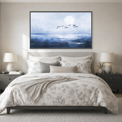 a serene bedroom scene with a large bed, a nightstand on each side, and a framed painting of a tranquil ocean landscape above the bed.