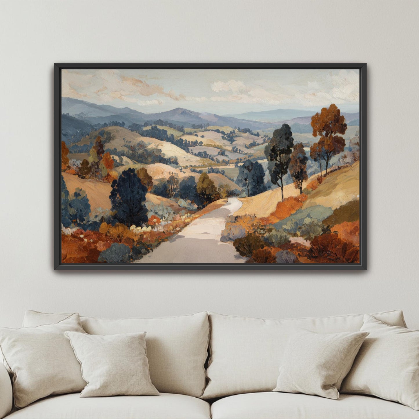 The image is a framed painting of a scenic countryside landscape, featuring rolling hills, trees, and a winding road.