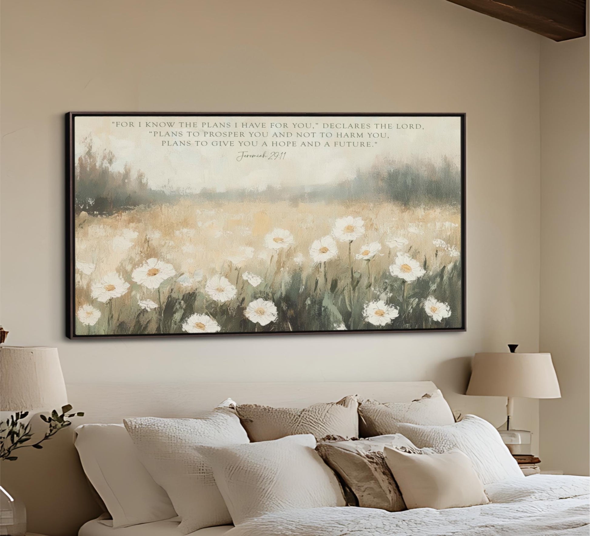 a bedroom with a large painting of a field of white flowers hanging on the wall above a bed with white pillows and a beige headboard.