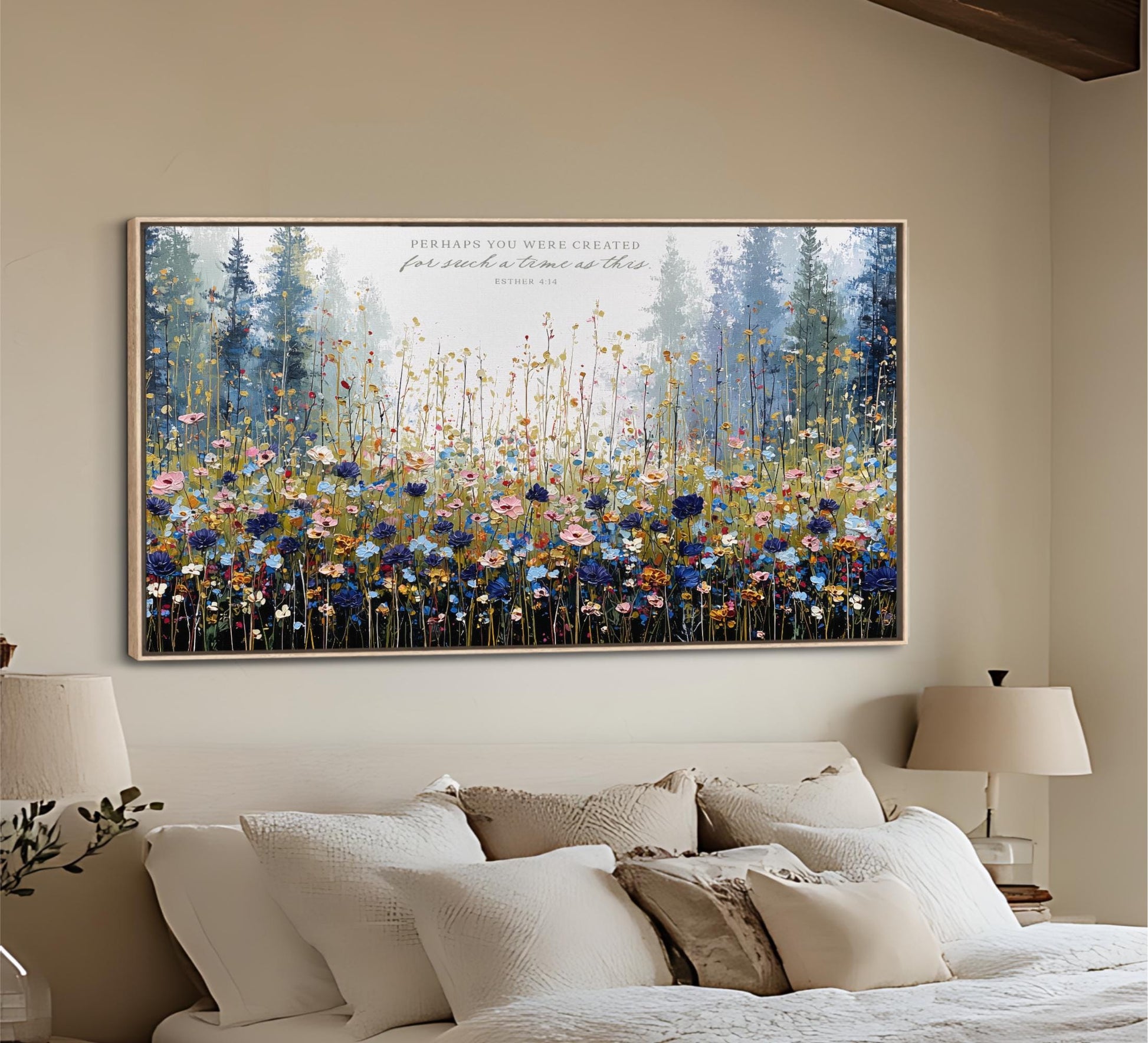 a large, colorful painting of a field of flowers hanging on a wall above a bed with white pillows.