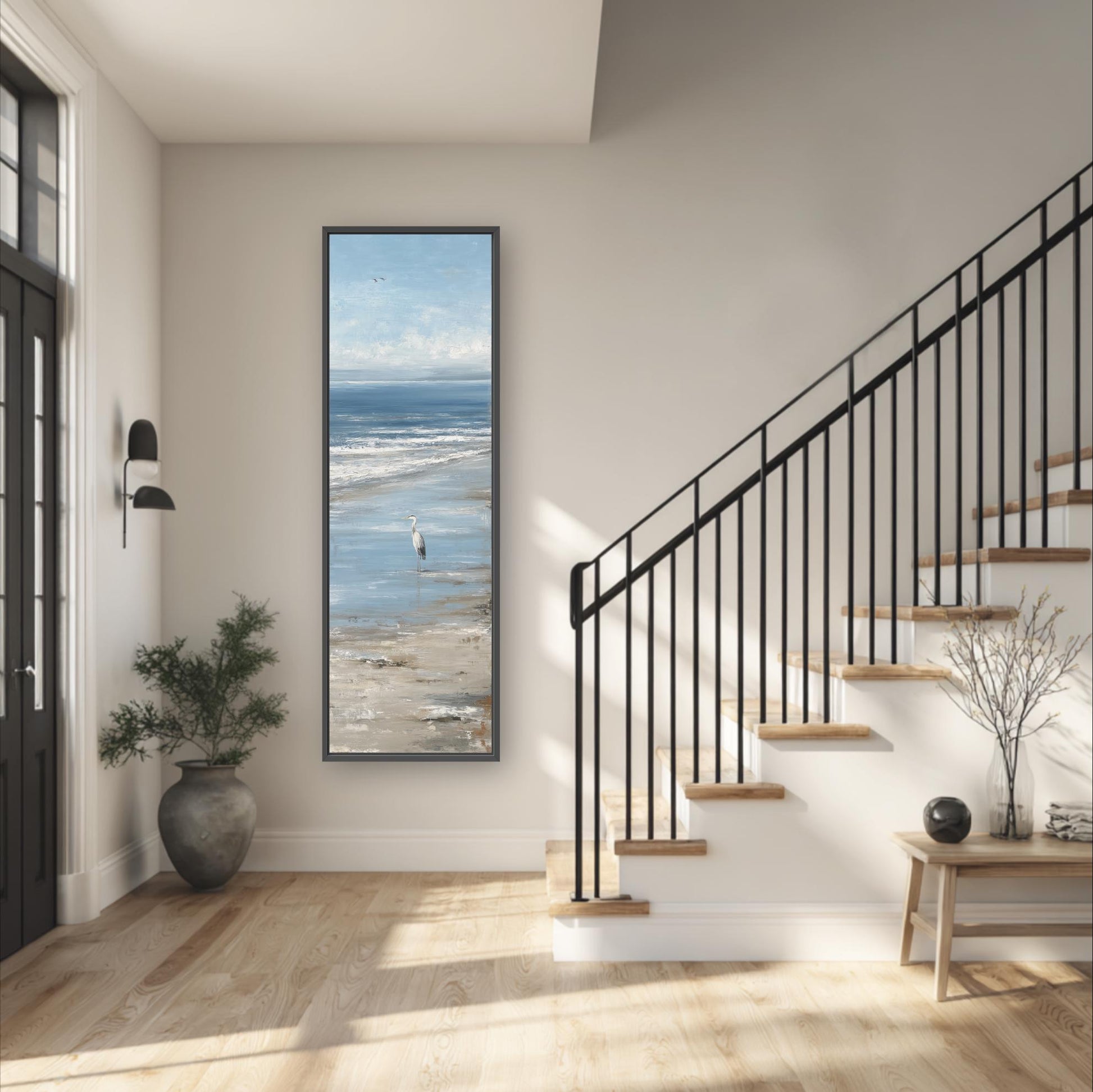 a serene and modern interior design, featuring a large window that offers a view of a beach, a black metal railing, a wooden staircase, and a potted plant.