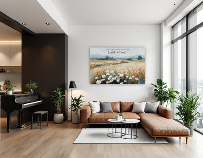 a modern living room with a large window, a brown leather sofa, a piano, and a painting of a field with flowers on the wall.