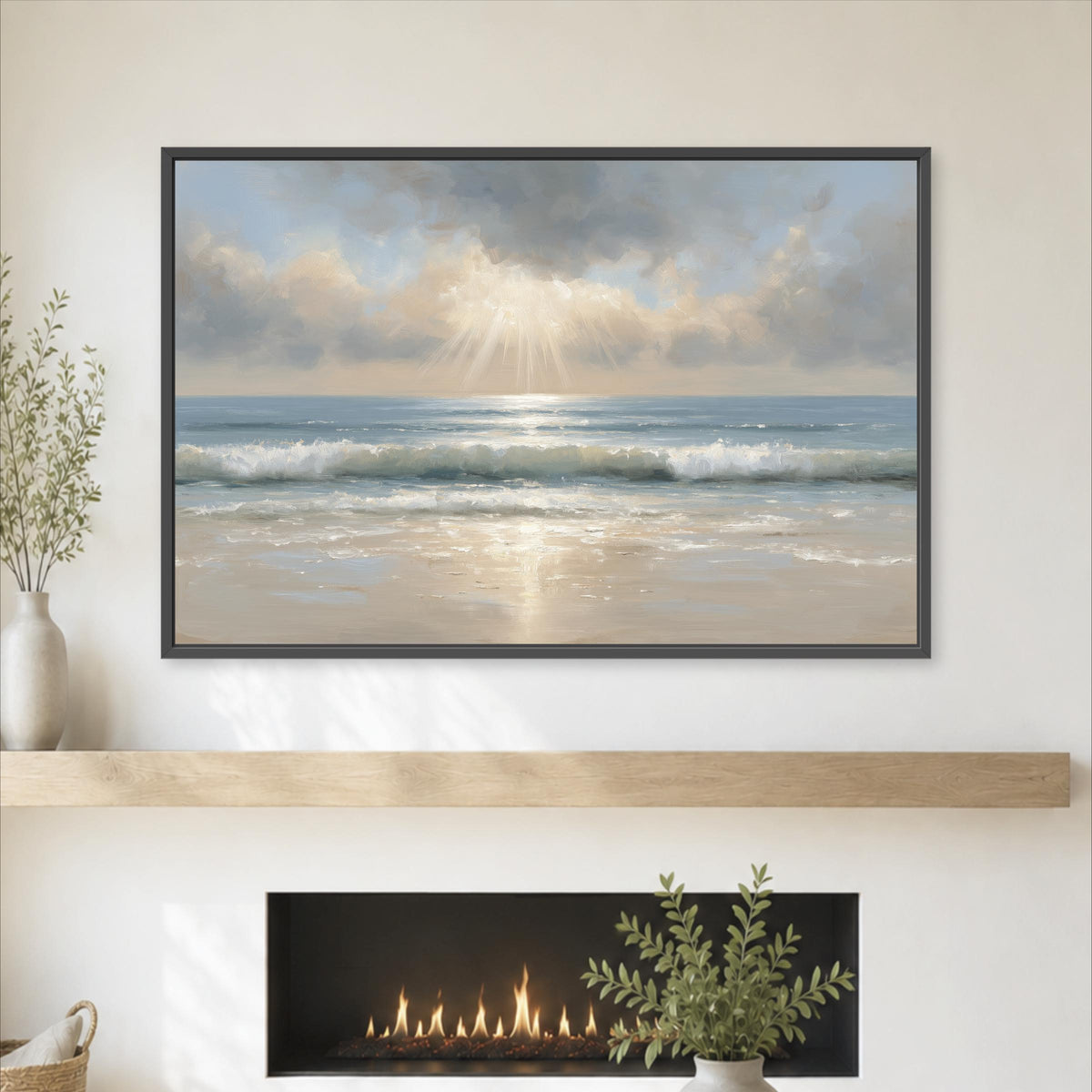 a large framed painting of a serene beach scene with waves crashing on the shore, a warm glow from the sun, and a cloudy sky. The painting is hung on a wall above a fireplace, which has a small plant on the mantel.