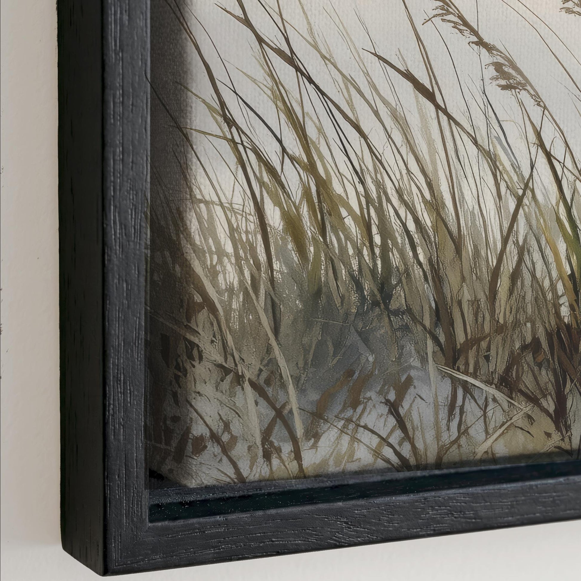 The image is a close-up of a framed painting depicting a field of tall grass.