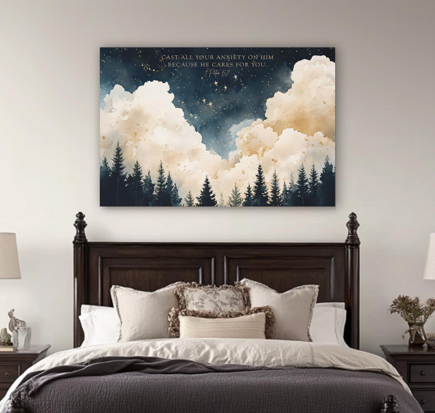 a large bedroom with a wooden headboard and a bed with white bedding. Above the bed is a large canvas print depicting a night sky with clouds and stars. The canvas print has a Bible verse from 2 Peter 1:22, which reads "Cast all your anxiety on Him because He cares for you."