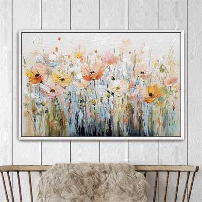 a large, colorful painting of flowers hanging on a wall above a wooden chair.