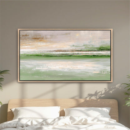 a large, framed painting of a serene landscape hanging on a wall above a bed with white pillows.