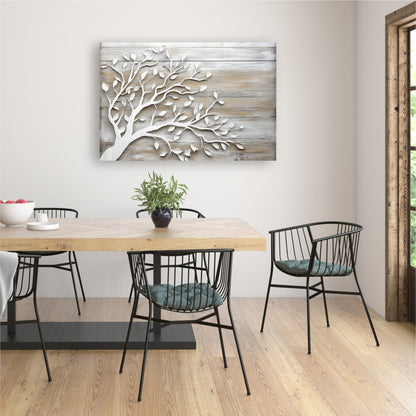 a dining room with a wooden table and chairs, a decorative wall hanging, and a potted plant on the table.