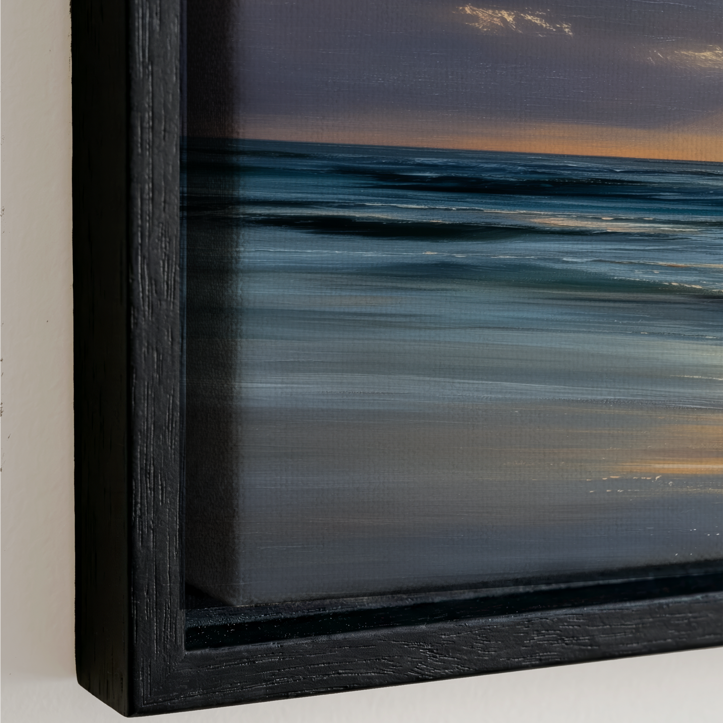 The image is a framed painting depicting a serene ocean scene with a sunset in the background.