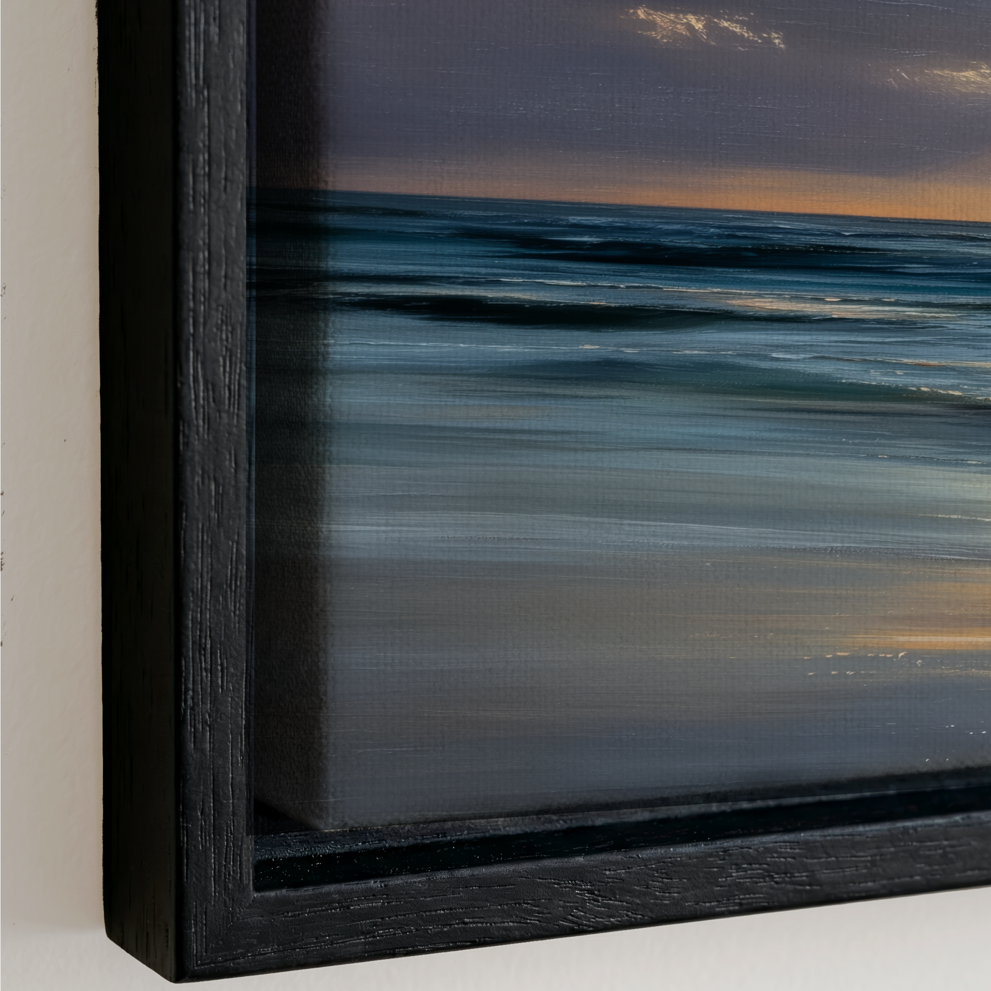 The image is a framed painting depicting a serene ocean scene with a sunset in the background.