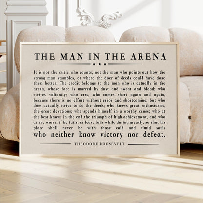 a quote from Theodore Roosevelt, a famous American author and President, which is framed and displayed in a wooden frame.