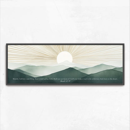 The image is a framed print depicting a serene landscape with a sun rising over a mountain range.