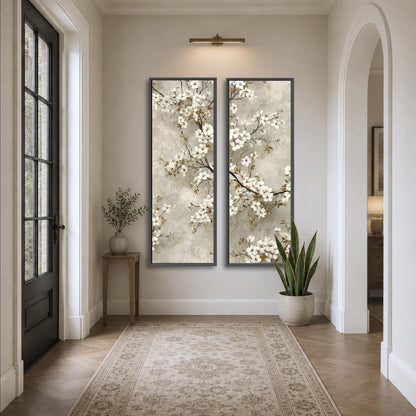 a hallway with a large floral painting hanging on the wall, a small table with a plant, and a rug on the floor.