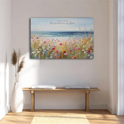 a serene indoor setting with a wooden bench, a white vase, and a painting of a field of flowers above it. The painting depicts a peaceful landscape with a body of water and a blue sky.