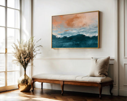 a serene and elegant living room with a large window, a wooden bench, a vase of white flowers, and a framed painting of a blue and orange ocean landscape hanging on the wall.